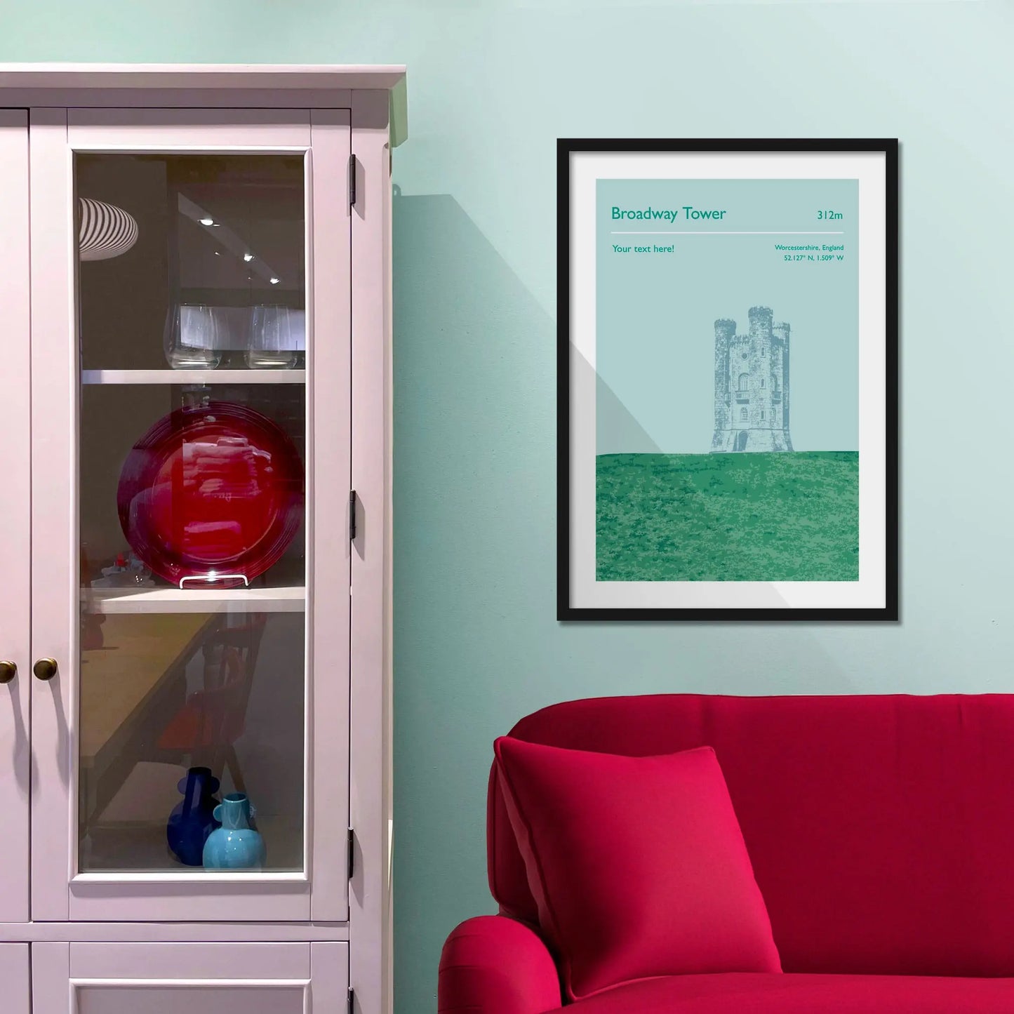 Framed picture on a baby blue wall beside pink shelving