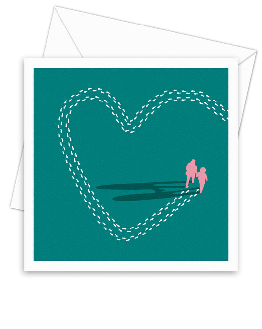 Square greetings card laying down on top of an envelope. The illustration on the card is a couple walking holding hands from above in pink, their footsteps are in the shape of a heart on a green background.